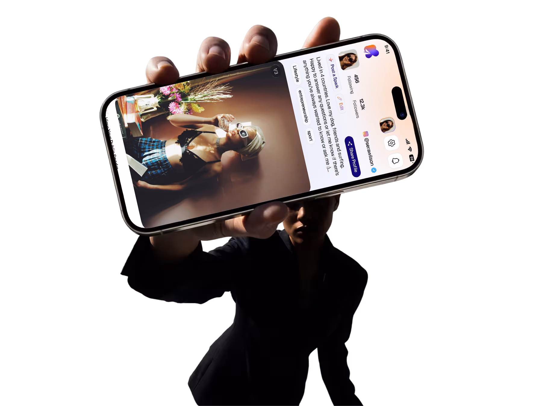 Hand holding iPhone showing a Kuriuus creator profile